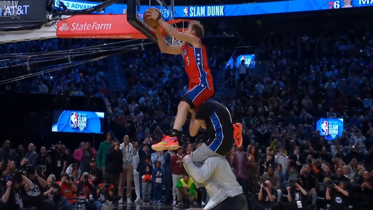 Mac McClung INSANE dunk over 2 people and taps backboard first - NBA Dunk Contest 2023
