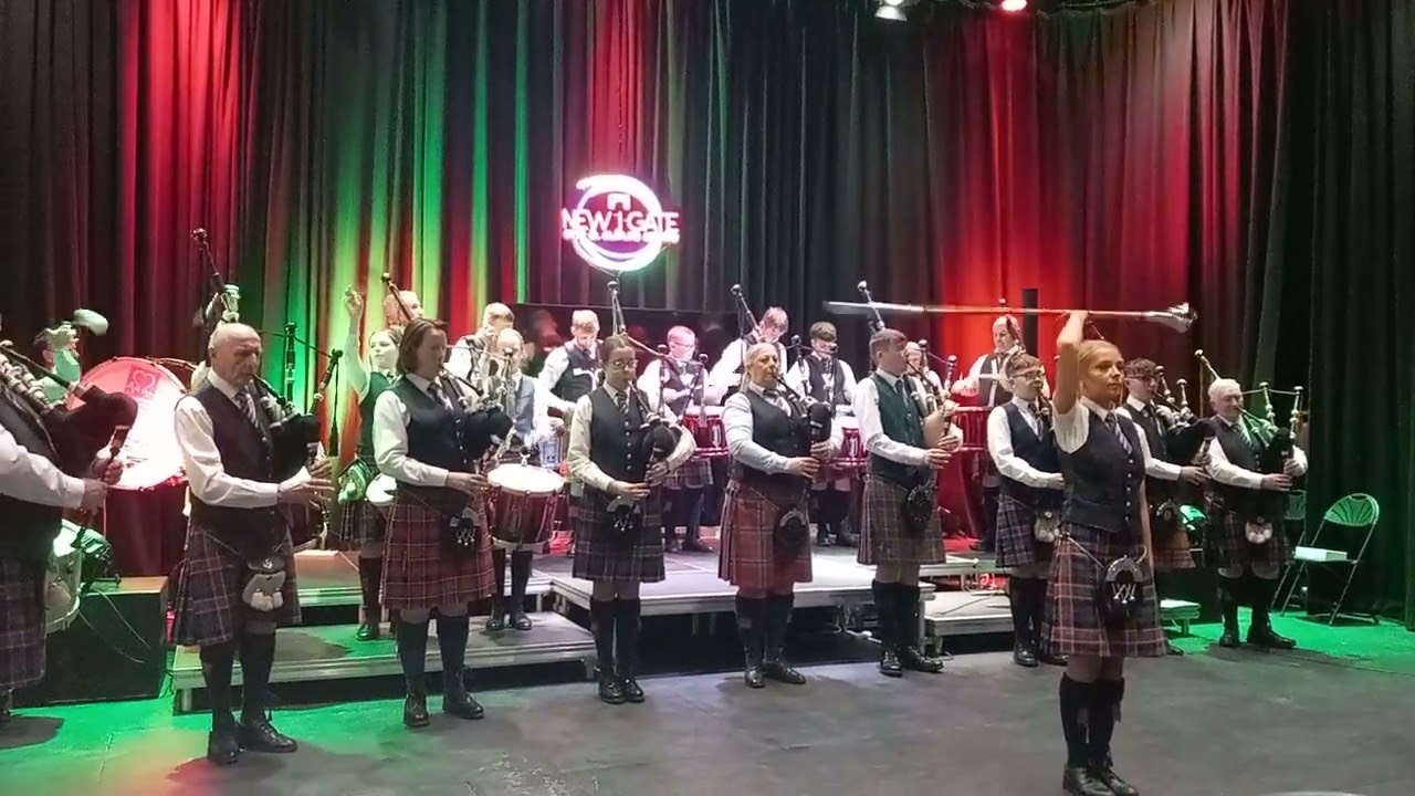 Massed band performance at our recognition event held in The New Gate Arts & Culture Centre .