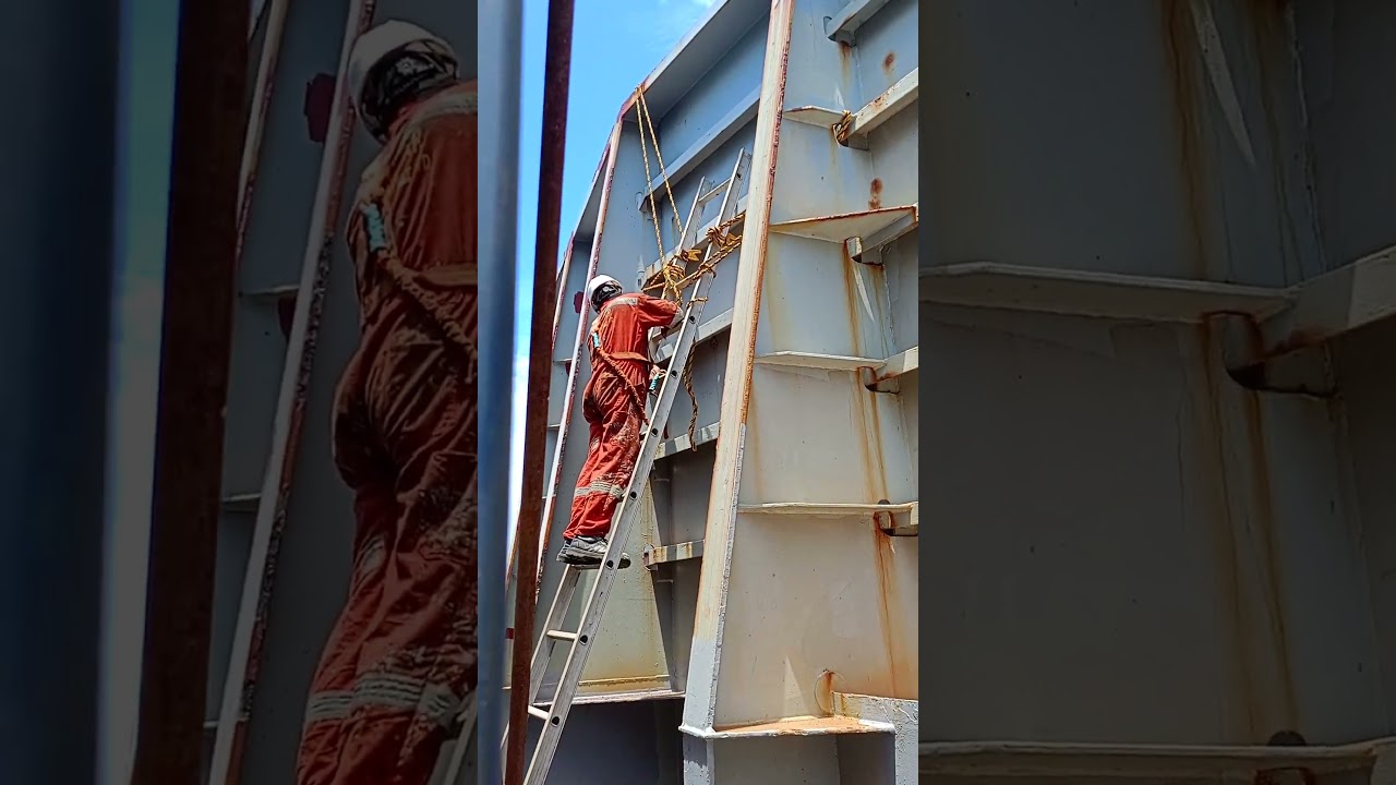 painting the rust of ship wind breaker with safetygear..